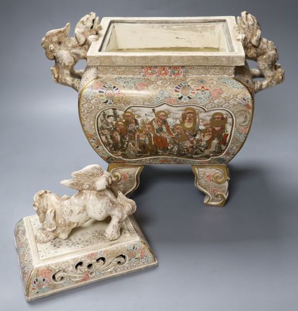 A large Japanese Satsuma pottery koro and cover, with Dog of Fo surmount and handles, 35cm high